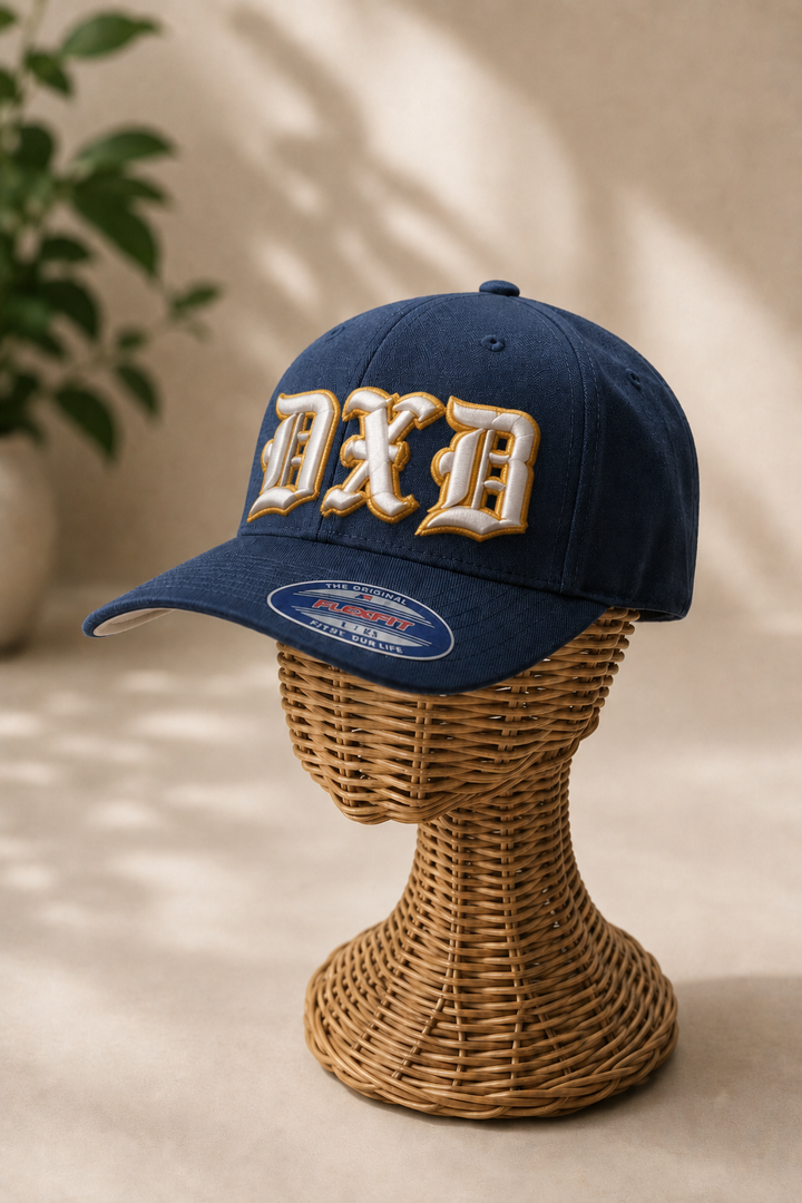 ✨ White Gold – Old English 3D Puff · White fill · Gold puff outline · Navy Flexfit curved | Hand Finished in Dubai | EmbroMania