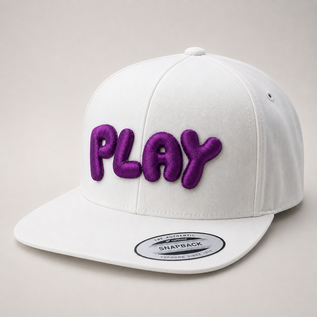 PlayPop rounded bubble-letter embroidery in Berry Pop — beige cap with deep purple 3D puff