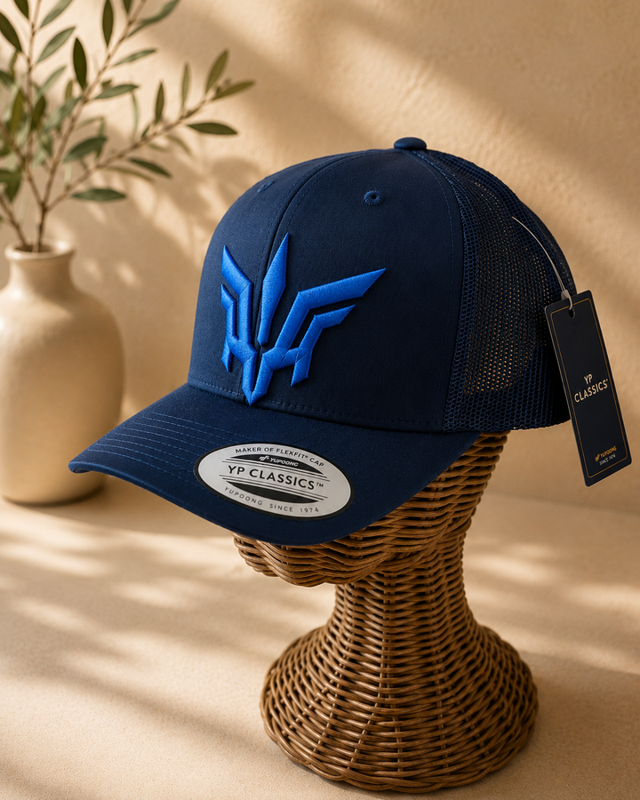 🔵⚔️ Sapphire Flight – Valkyrie Crest · Blue puff · Dark Navy Curved Trucker | Hand Finished in Dubai | EmbroMania